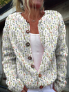 V-ringet jacquard-cardigan med blomsterprint for en unik og elegant vårstil